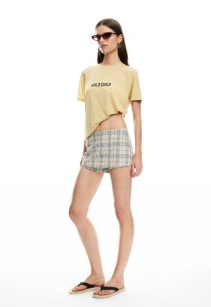 UNCHARTED SKORT – BEIGE PLAID